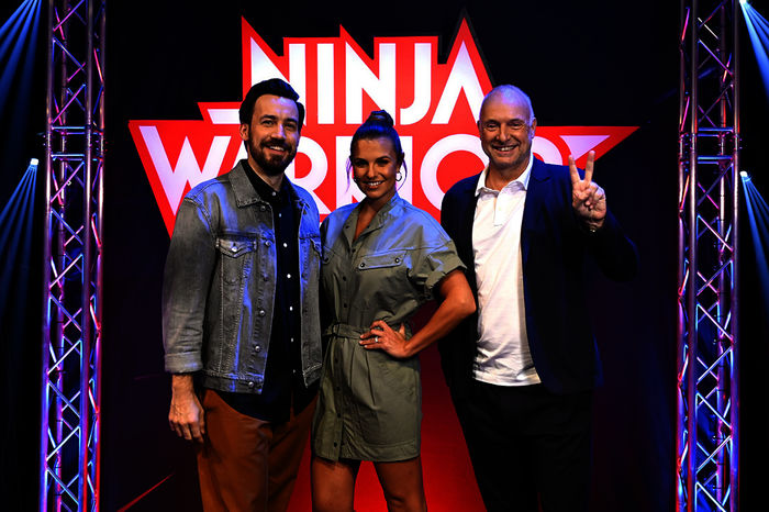 Jan K&ouml;ppen, Laura Wontorra, Frank Buschmann. Bild: Sender / TVNOW / Markus Hertrich 