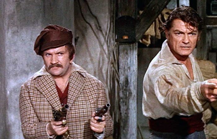 Graf de Sambreuil (Jean Marais, r.) und sein Freund "Messerstecher" (Pierre Mondy) suchen das M&auml;dchen Marie in der Pariser Unterwelt. Bild: Sender / Tobis